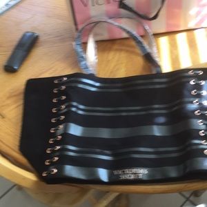 Victorie secret black bag with copper eyelets.